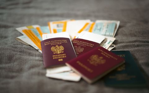 A passport and immigration paperwork