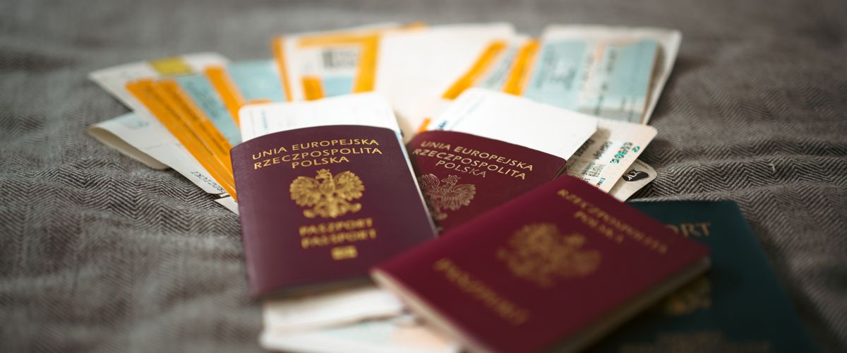 A passport and immigration paperwork
