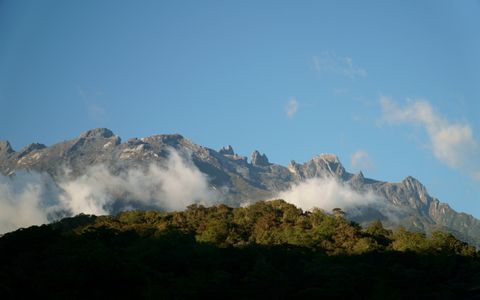 Mount Kinabalu in Sabah, which runs a separate MM2H scheme