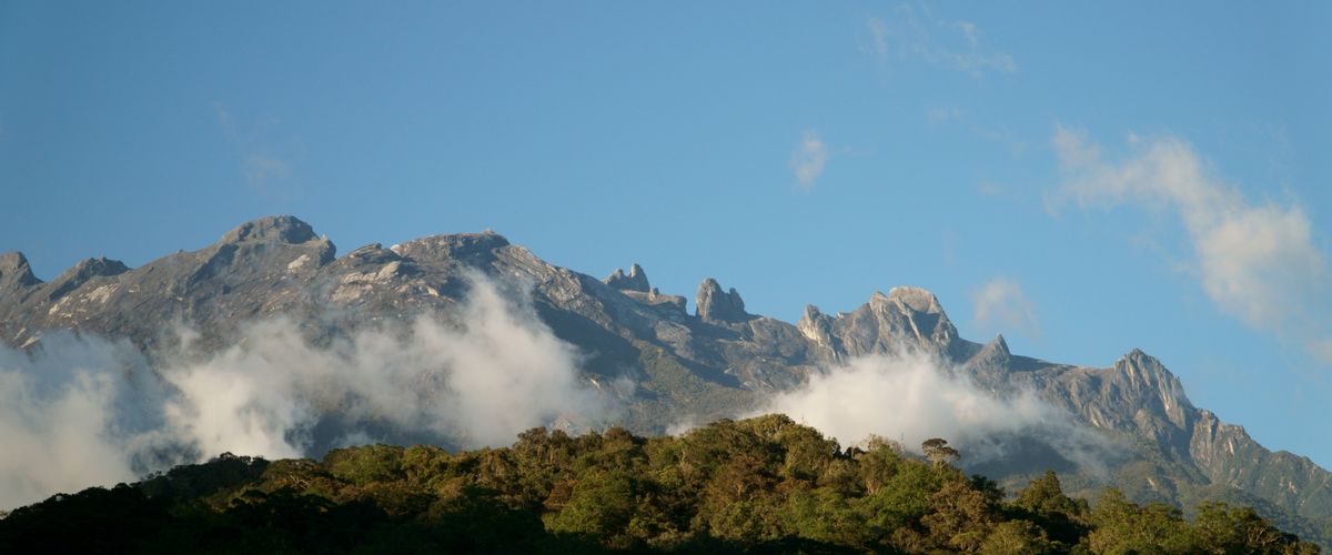 Mount Kinabalu in Sabah, which runs a separate MM2H scheme